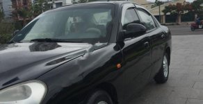 Daewoo Nubira 2003 - Gia đình bán Daewoo Nubira đời 2003, màu đen giá 95 triệu tại Bình Định