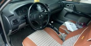Mazda 323 2003 - Bán Mazda 323 sản xuất 2003, màu đen số sàn, giá 162tr giá 162 triệu tại Hà Tĩnh