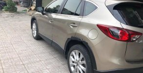 Mazda CX 5 2.0 AT 2014 - Bán Mazda CX 5 2.0AT năm sản xuất 2014, màu vàng cát giá 735 triệu tại Thái Nguyên