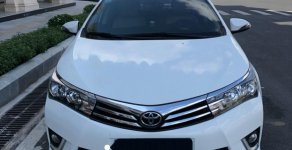 Toyota Corolla altis 1.8 G 2015 - Bán xe Toyota Corolla altis 1.8 G đời 2015, màu trắng số tự động giá 660 triệu tại Hậu Giang