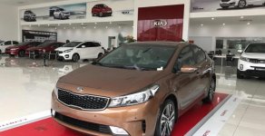 Kia Cerato 1.6 AT 2018 - Cần bán xe Kia Cerato 1.6 AT sản xuất 2018, màu nâu, giá chỉ 589 triệu giá 589 triệu tại Nam Định
