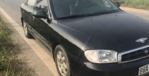 Kia Spectra   2005 - Cần bán lại xe Kia Spectra đời 2005, màu đen giá 100 triệu tại Phú Thọ