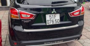 Mitsubishi Outlander Sport Sport 2014 - Bán xe Mitsubishi Outlander Sport sản xuất năm 2014, màu đen, nhập khẩu nguyên chiếc giá 650 triệu tại Tp.HCM