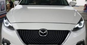Mazda 3  AT 2015 - Cần bán Mazda 3 AT 2015, màu trắng, odo 5 vạn chuẩn giá 576 triệu tại Hải Phòng