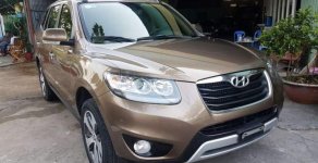 Hyundai Santa Fe   2011 - Bán Hyundai Santa Fe năm 2011, màu nâu, nhập khẩu nguyên chiếc, xe gia đình sử dụng thật kĩ giá 655 triệu tại Đồng Tháp