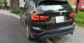 BMW X1 2015 - Bán ô tô BMW X1 đời 2015, màu đen, nhập khẩu giá 1 tỷ 210 tr tại Tp.HCM