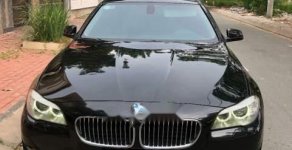 BMW 5 Series 523i  2010 - Cần bán lại xe BMW 5 Series 523i sản xuất 2010, màu đen  giá 865 triệu tại Tp.HCM