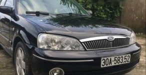 Ford Laser 2002 - Bán xe Ford Laser năm sản xuất 2002, màu đen giá 165 triệu tại Nam Định