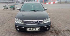 Ford Laser Ghia 2004 - Bán Ford Laser Ghia 2004, màu đen như mới, giá tốt giá 160 triệu tại Hà Nội