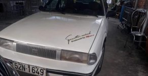 Kia Carens 1989 - Bán xe Kia Carens đời 1989, màu trắng, nhập khẩu nguyên chiếc giá 27 triệu tại Đồng Tháp