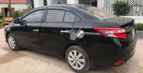 Toyota Vios 1.5E 2015 - Cần bán Toyota Vios 1.5E đời 2015, màu đen chính chủ giá 455 triệu tại Quảng Trị