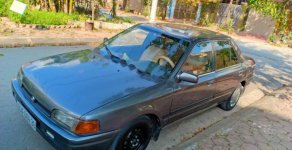 Mazda 323 1.6 MT 1996 - Cần bán Mazda 323 1.6 MT năm sản xuất 1996, màu xám  giá 65 triệu tại Hà Nam