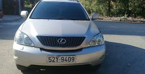 Lexus RX 350 2006 - Cần bán Lexus RX 350 đời 2006, màu vàng cát sa mạc, xe nhập khẩu, 725 triệu giá 725 triệu tại Tp.HCM