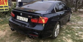 BMW 3 Series 320I 2014 - Cần bán gấp BMW 3 Series 320I sản xuất năm 2014, màu đen, nội thất zin, đồ chơi đầy đủ giá 1 tỷ tại Bình Dương