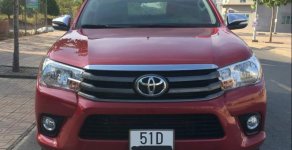 Toyota Hilux 2.4E  2016 - Chính chủ bán xe Toyota Hilux 2.4E 2016, màu đỏ, xe nhập giá 575 triệu tại Đồng Nai