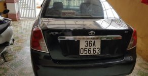 Daewoo Lacetti EX 2005 - Cần bán Daewoo Lacetti Ex đời 2005, màu đen, xe gia đình sử dụng nên rất giữ xe giá 160 triệu tại Thanh Hóa