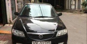 Mazda 323   2003 - Bán xe Mazda 323 đời 2003 màu đen, đang sử dụng tốt giá 160 triệu tại Bắc Giang