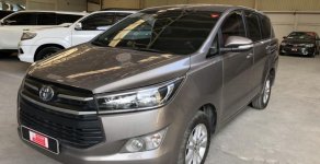 Toyota Innova G 2016 - Bán xe Innova G 2016, tự động, màu đồng, liên hệ để được giá tốt nhất giá 730 triệu tại Tp.HCM