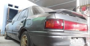 Mazda 323 1994 - Cần bán xe Mazda 323 đời 1994, màu xám giá 40 triệu tại Thanh Hóa