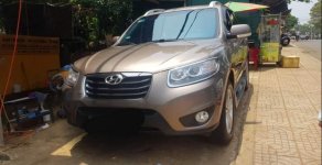 Hyundai Santa Fe 2011 - Cần bán lại xe Hyundai Santa Fe năm 2011, màu vàng, nhập khẩu, 590tr giá 590 triệu tại Đắk Nông