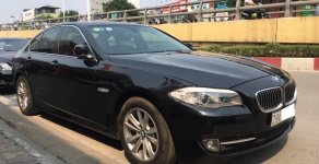 BMW 5 Series 520i 2013 - Cần bán lại xe BMW 5 Series 520i 2013, màu đen, xe nhập giá 1 tỷ 175 tr tại Hà Nội