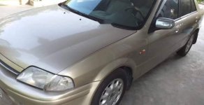 Ford Laser 2000 - Cần bán gấp Ford Laser đời 2000, màu vàng, nhập khẩu, 150tr giá 150 triệu tại Quảng Trị