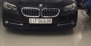 BMW 5 Series 520i 2014 - Cần bán lại xe BMW 520i đăng ký lần đầu 2014, màu đen nhập giá 1 tỷ 350 tr tại Tp.HCM