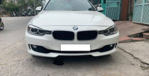 BMW 3 Series 320i 2014 - Cần bán xe BMW 320i 2014 ĐK 2015, số tự động màu trắng giá 915 triệu tại Tp.HCM