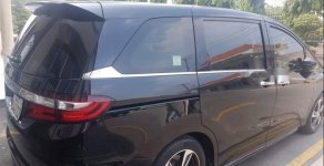 Honda Odyssey 2016 - Cần bán lại xe Honda Odyssey sản xuất năm 2016, màu đen giá 1 tỷ 615 tr tại Tp.HCM
