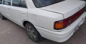 Mazda 323 1994 - Cần bán xe Mazda 323 sản xuất năm 1994, màu trắng, nhập khẩu nguyên chiếc, 55 triệu giá 55 triệu tại Tp.HCM