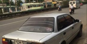 Toyota Corolla  MT 1989 - Bán Toyota Corolla MT đời 1989, màu bạc, máy êm ru giá 100 triệu tại Tp.HCM