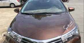Toyota Corolla altis AT 2015 - Cần bán lại xe Toyota Corolla altis AT sản xuất 2015, màu nâu chính chủ giá 625 triệu tại Bình Dương
