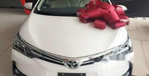 Toyota Corolla altis  1.8E  2019 - Cần bán xe Toyota Corolla Altis 1.8E 2019, màu trắng, 733 triệu giá 733 triệu tại Cần Thơ