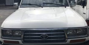 Toyota Land Cruiser 1996 - Bán Toyota Land Cruiser sản xuất 1996, màu trắng, nhập khẩu, 7 chỗ giá 140 triệu tại Tp.HCM
