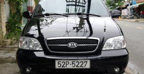 Kia Carnival GS 2008 - Cần bán Kia Carnival GS sản xuất 2008, màu đen giá 245 triệu tại Tp.HCM