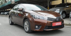 Toyota Corolla altis 1.8AT  2014 - Cần bán xe Toyota Corolla altis sản xuất năm 2014, màu nâu giá 605 triệu tại Hà Nội