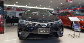 Toyota Corolla altis 1.8E 2018 - Bán Corolla Altis 2019 giá cực sốc giá 697 triệu tại Hà Nội