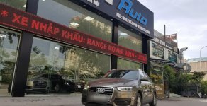 Audi Q3 2.0 TFSI 2014 - Cần bán Audi Q3 sx 2014, đăng ký lần đầu 2015 màu nâu giá 1 tỷ 120 tr tại Hà Nội