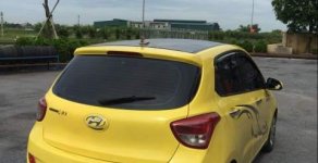 Hyundai Grand i10   2015 - Bán ô tô Hyundai Grand i10 2015, màu vàng, xe đẹp, gầm bệ chắc chắn đã nên đồ chơi giá 220 triệu tại Nam Định