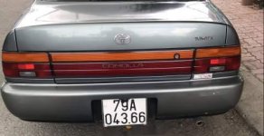 Toyota Corolla 1995 - Cần bán Toyota Corolla 1995, màu xám giá 150 triệu tại Vĩnh Long