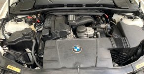 BMW 3 Series 320i 2009 - Cần bán lại xe BMW 3 Series 320i sản xuất năm 2009, màu trắng, đăng ký 2010, biển số thành phố giá 450 triệu tại Tp.HCM