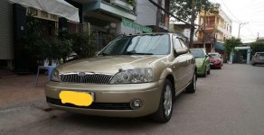 Ford Laser   2003 - Bán Ford Laser sản xuất 2003, màu vàng cát, xe công ty không hóa đơn giá 128 triệu tại Cần Thơ