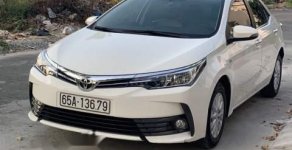 Toyota Corolla altis 2018 - Lên đời bán xe Toyota Corolla altis năm 2018, màu trắng giá 650 triệu tại Cần Thơ