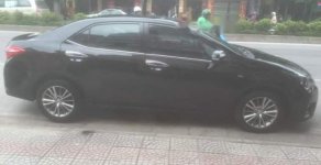 Toyota Corolla altis   2014 - Bán Toyota Corolla altis sản xuất 2014, màu đen  giá 600 triệu tại Hà Nội