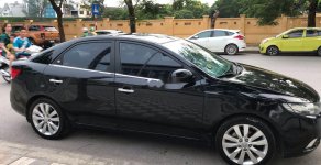 Kia Cerato AT 2009 - Xe Kia Cerato AT năm sản xuất 2009, màu đen, nhập khẩu giá 310 triệu tại Hà Nội