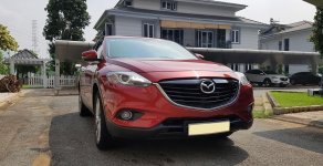 Mazda CX 9 AWD 2015 - Cần bán xe Mazda Cx9 2015 số tự động màu đỏ, 7 chỗ giá 895 triệu tại Tp.HCM