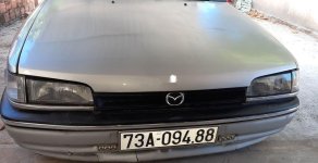 Mazda 323  1.6MT  1995 - Cần bán xe Mazda 323 1.6MT đời 1995, màu bạc, nội thất đẹp chính chủ giá 45 triệu tại Quảng Bình