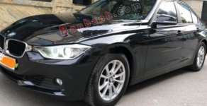 BMW 3 Series 320i 2012 - Cần bán xe BMW 320i sản xuất 2012, model 2013 màu đen giá 720 triệu tại Hà Nội