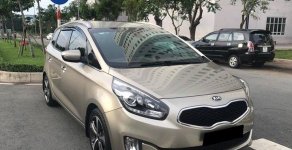 Kia Rondo DAT 2017 - Bán Kia Rondo 2017 tự động, máy dầu, màu vàng, chính chủ giá 536 triệu tại Tp.HCM