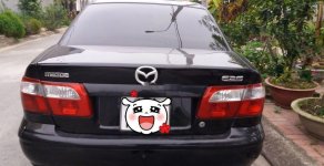 Mazda 626    1999 - Chính chủ bán xe Mazda 626 đời 1999, màu đen giá cạnh tranh giá 120 triệu tại Hưng Yên